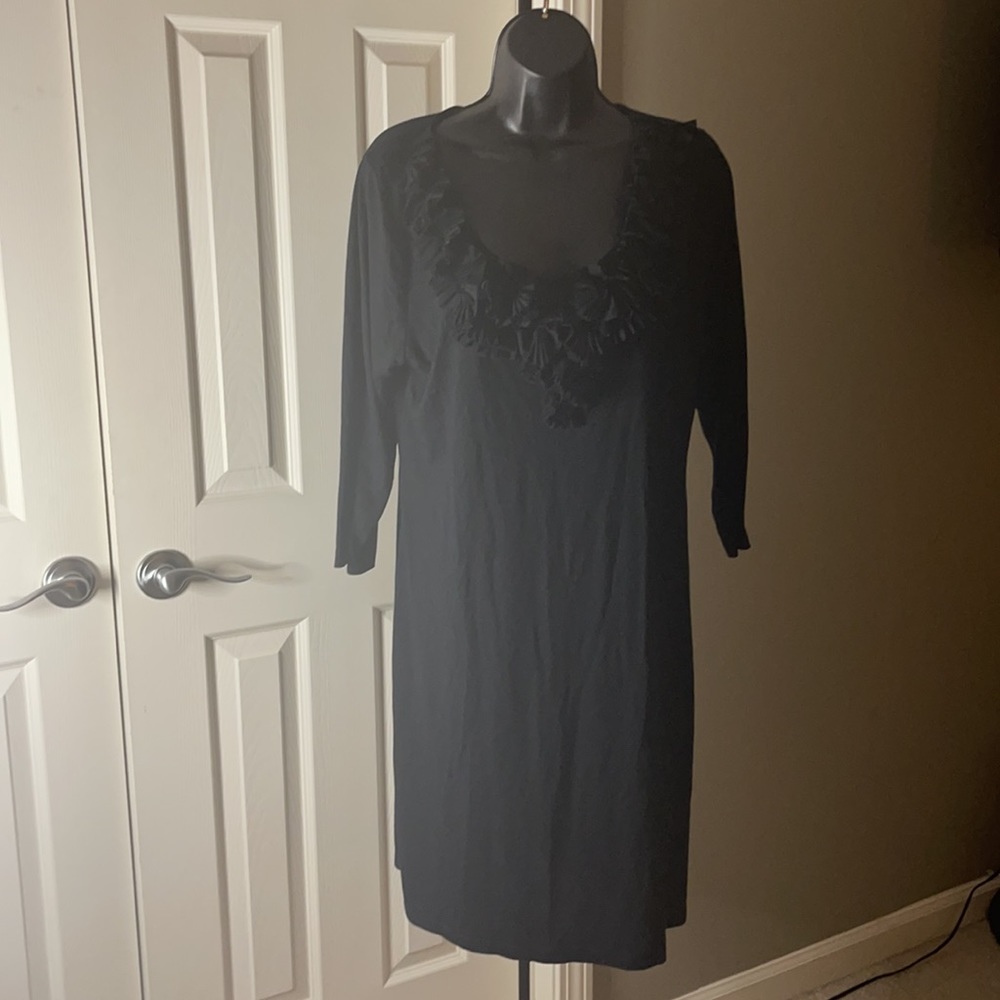 Black dress with floral ruffle collar
